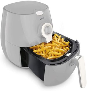 Philips Daily Collection Air Fryer in use.