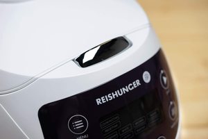 Up close view of the Reishunger Digital Mini Rice Cooker and Steamer.